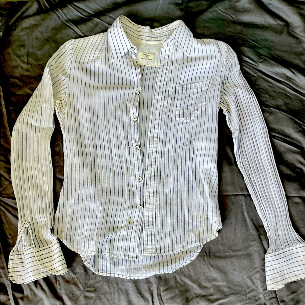 Super-soft, white cotton button down with thin black strips.